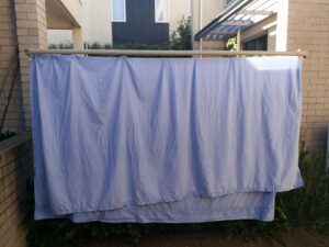 Sheets hanging on a clothesline